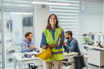 architect-in-office-w-hardhat-safety-vest-getty-1041377200